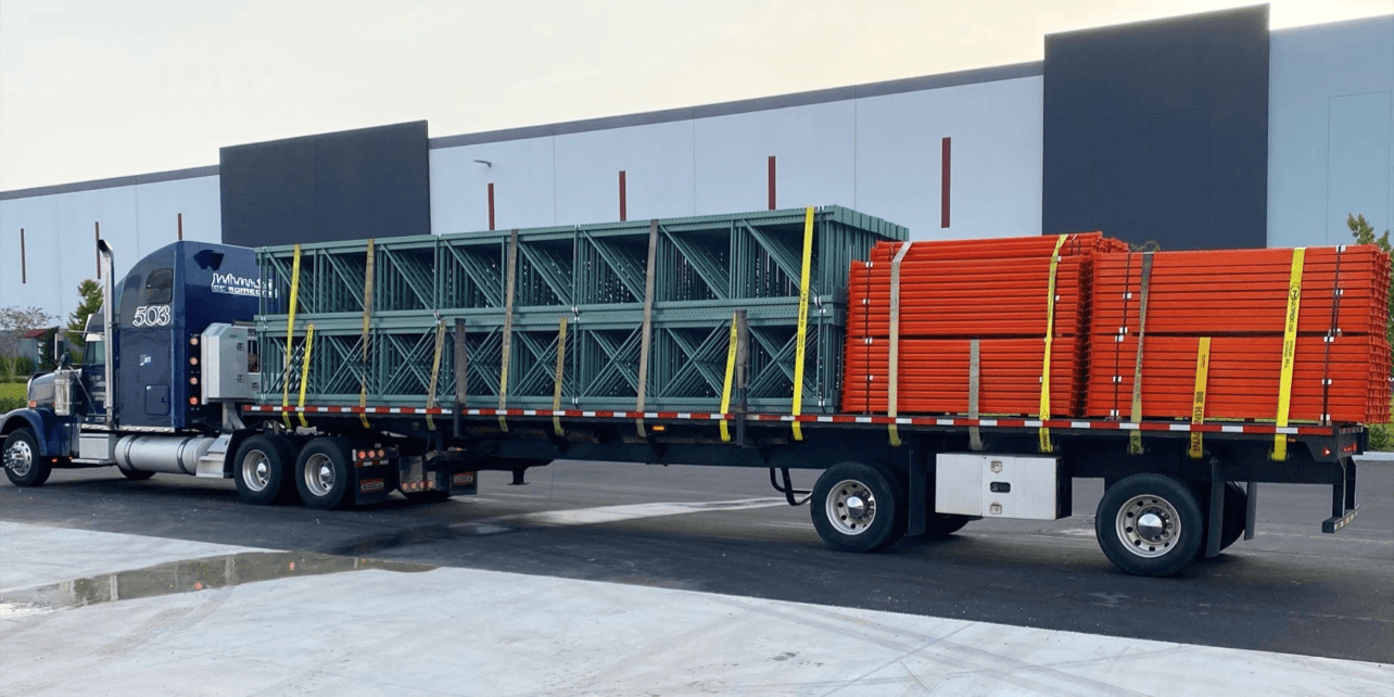 Freight truck delivering warehouse equipment